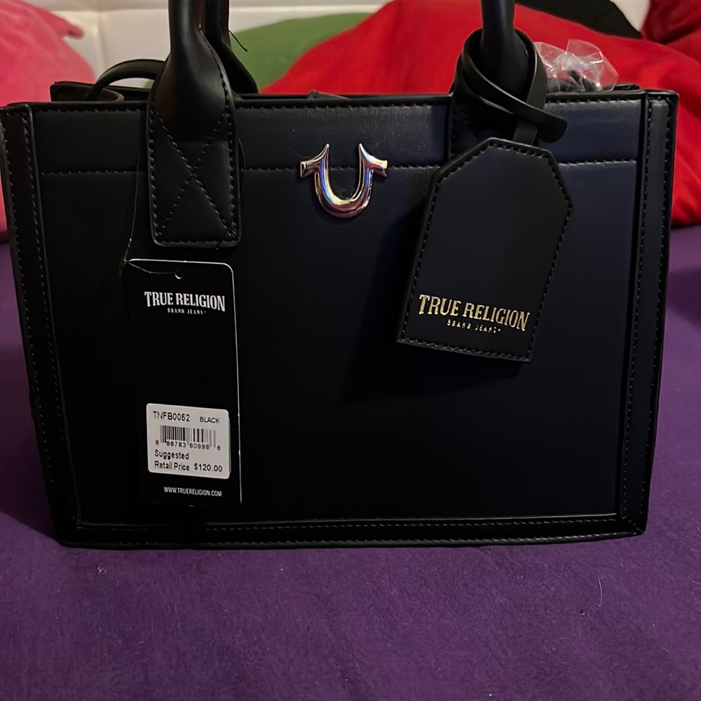 True religion hand Bag comes with strap too